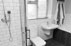 We designed and installed this contemporary bathroom with funky tiling.